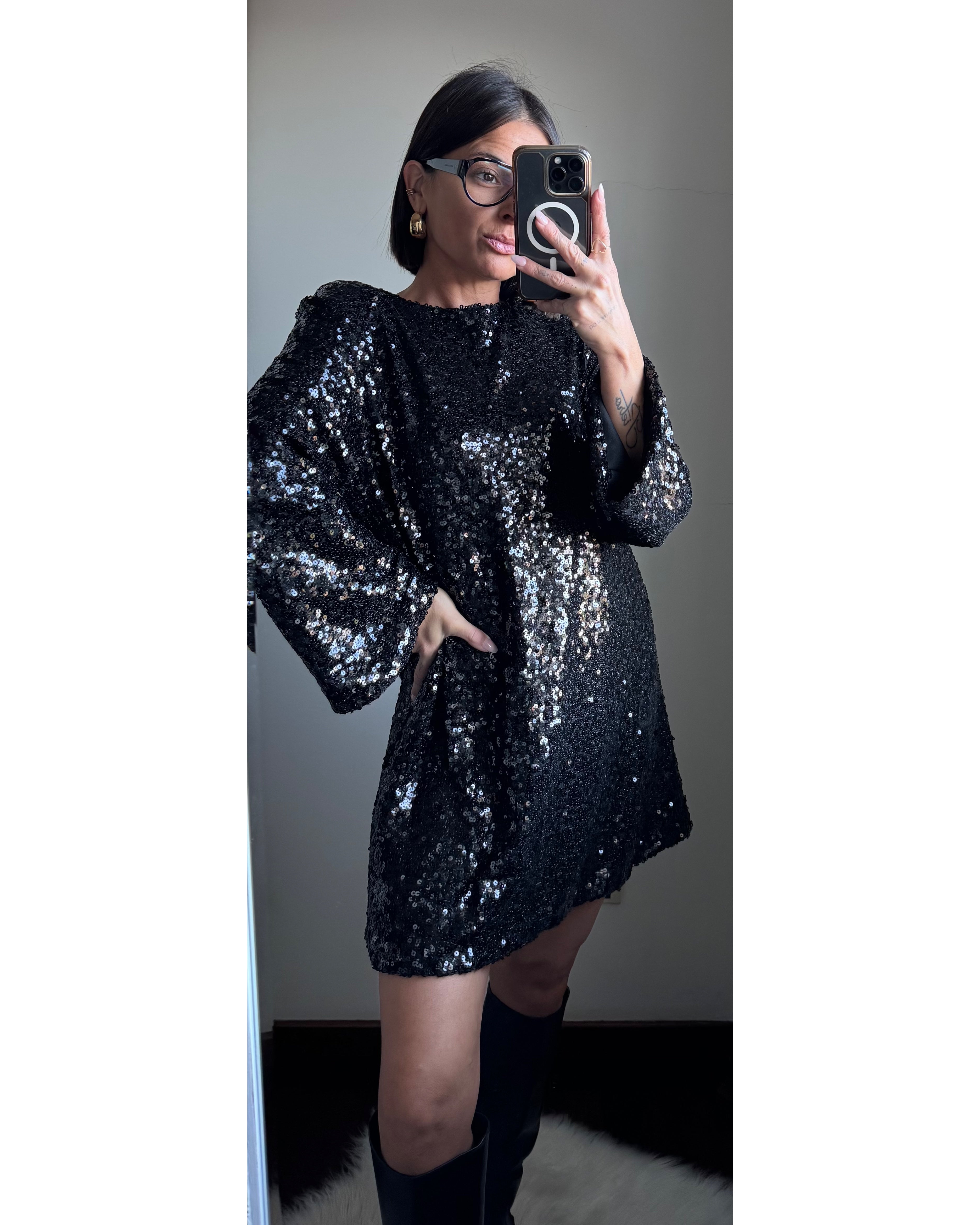 Abito paillettes con fiocco