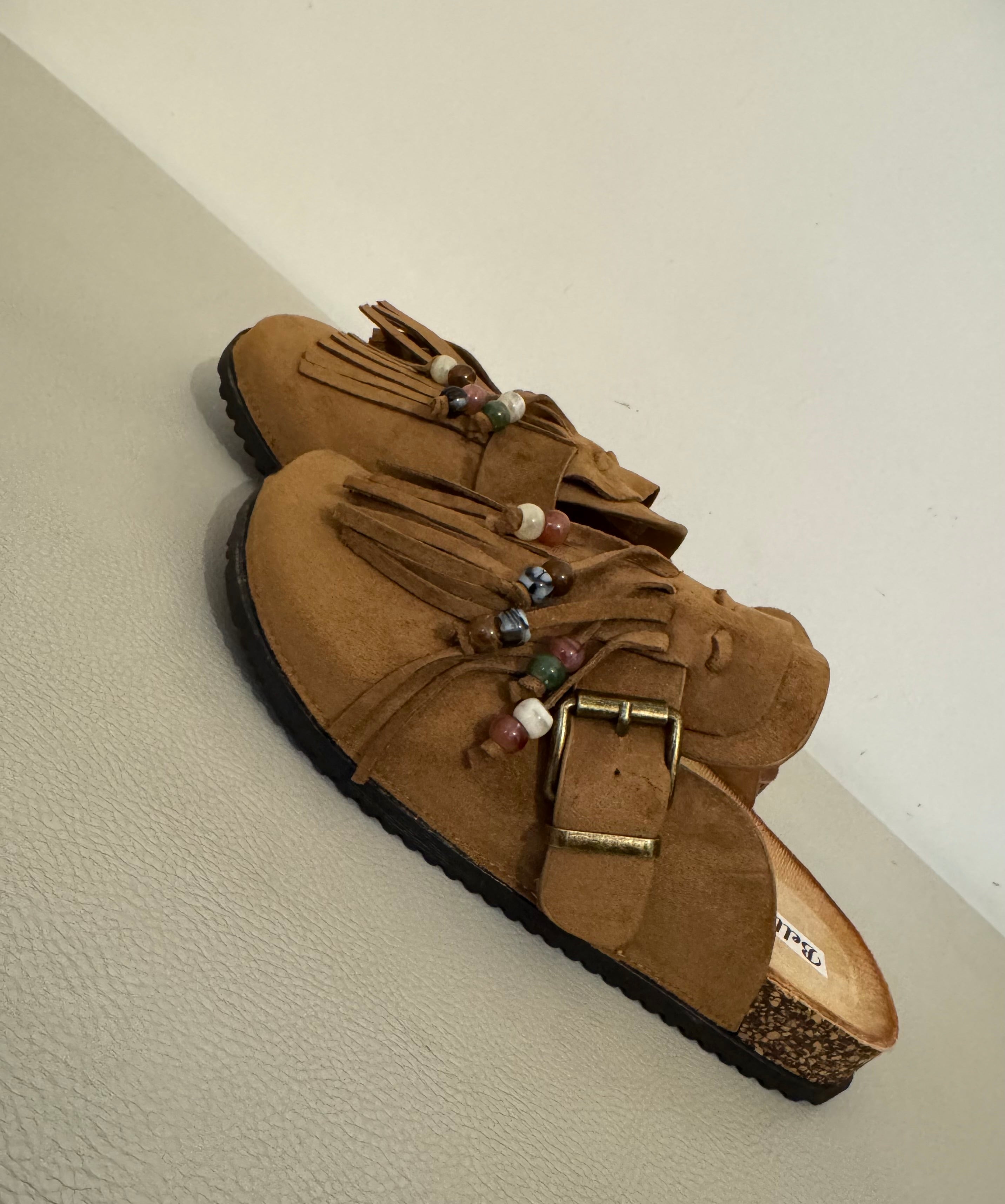 Mules con frange e perline