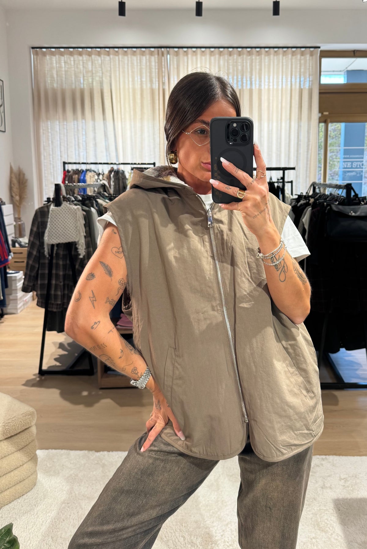 Gilet reversibile con cappuccio