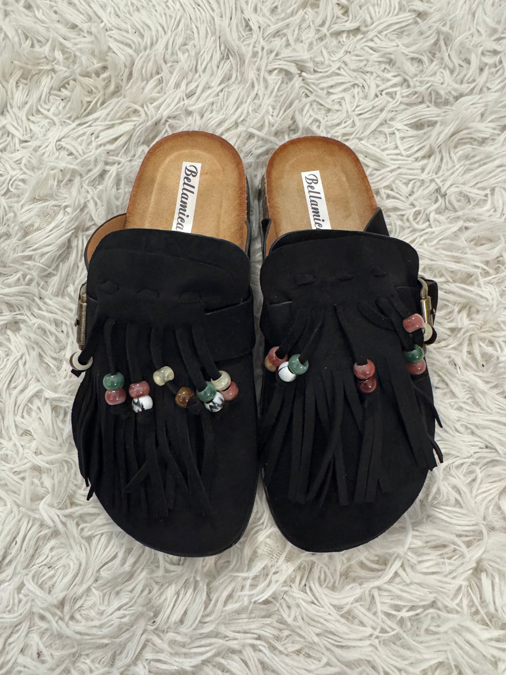 Mules con frange e perline
