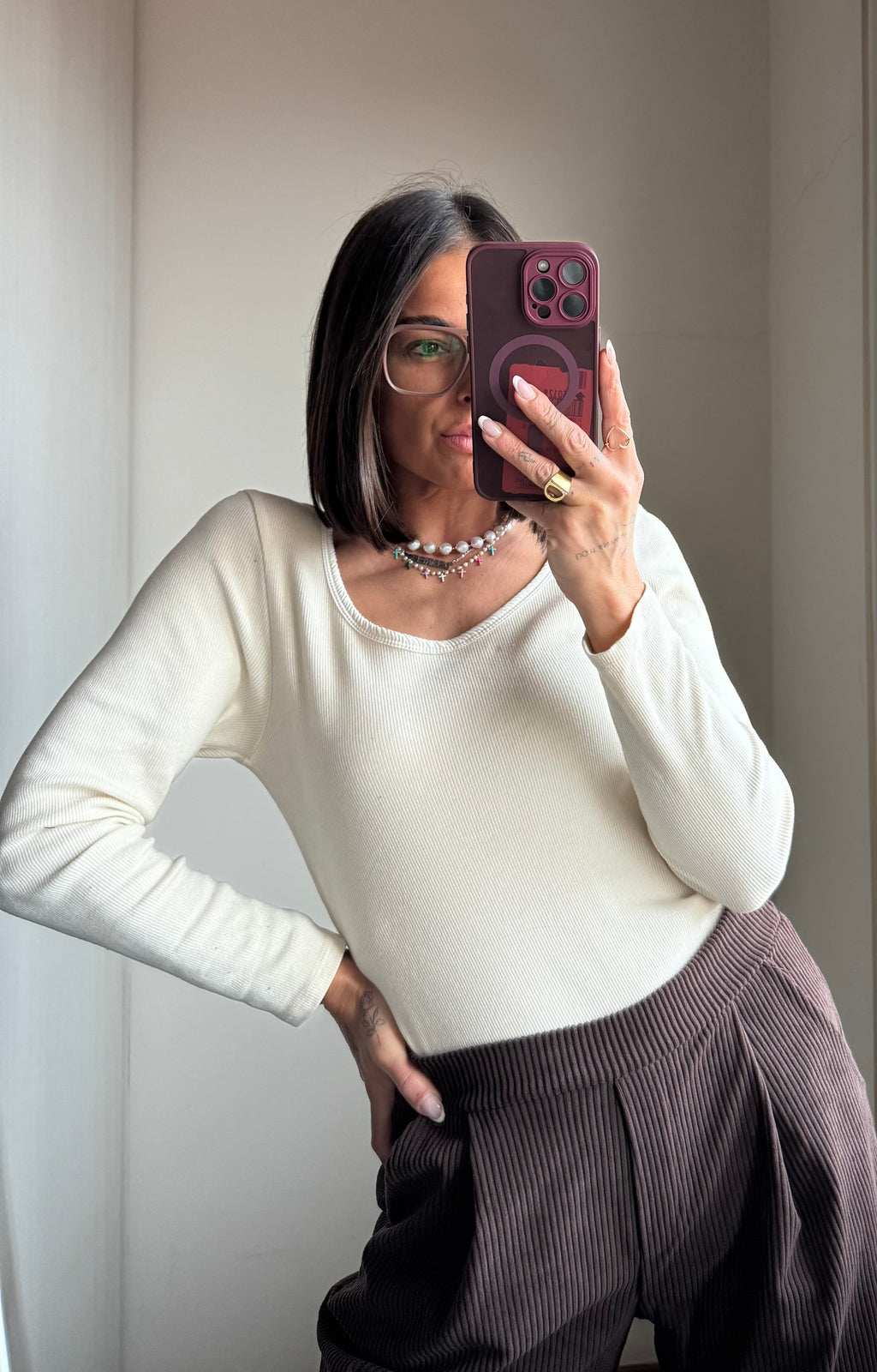 Maglia a manica lunga con scollo a madonna