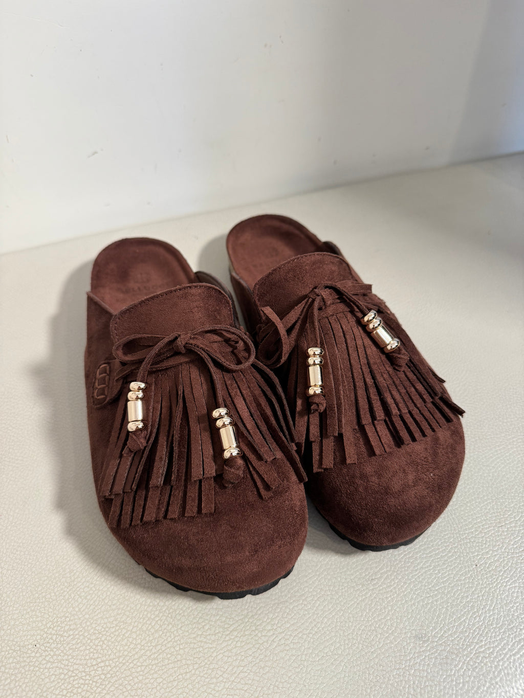 Mules con frange