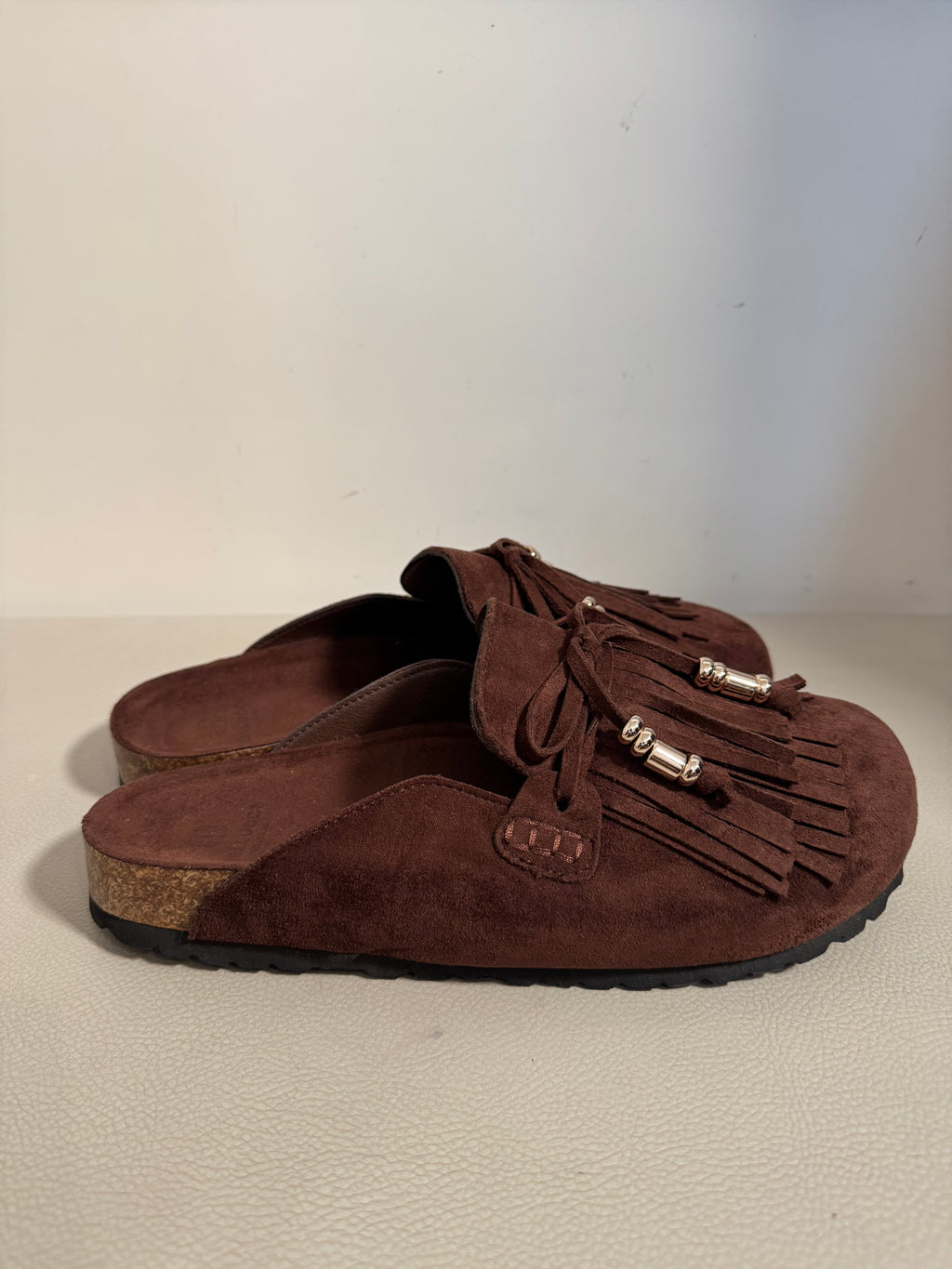 Mules con frange